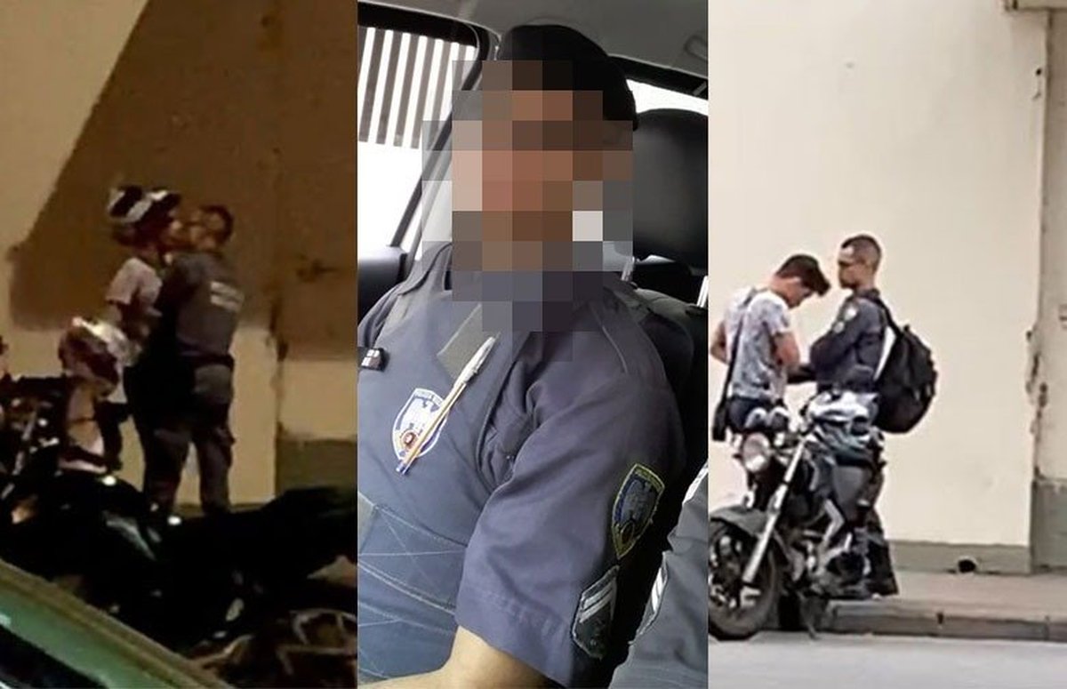 Fardado e armado, policial militar beija o namorado no meio da rua em Vitória e chama a atenção de populares